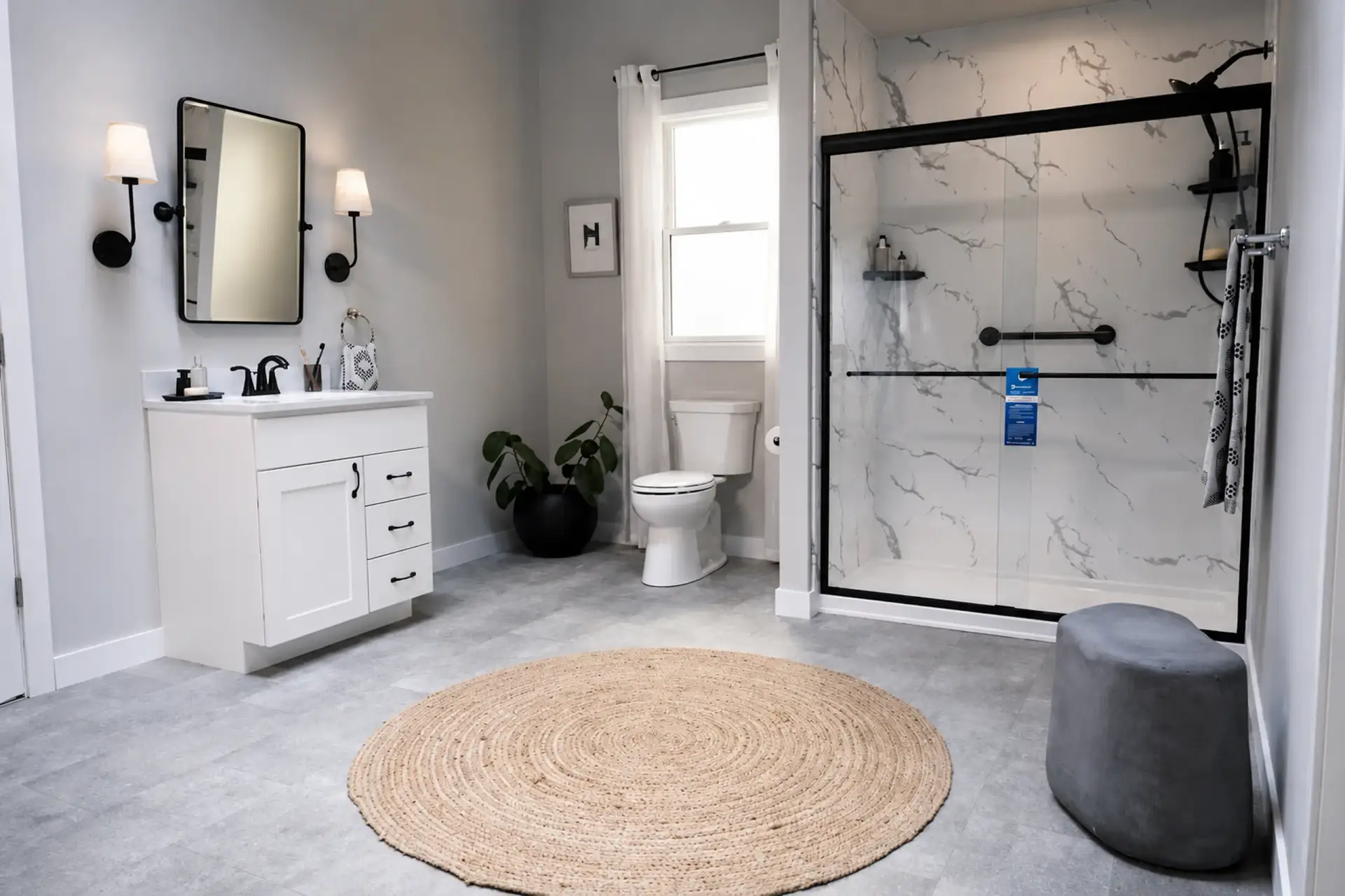 Bright, newly remodeled bathroom with a freestanding tub and coordinated fixtures